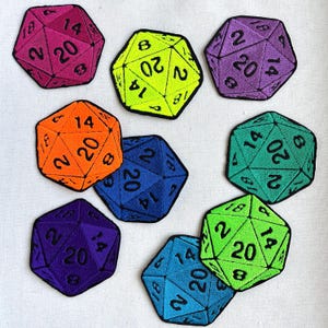 May include: Set of ten colorful embroidered iron-on patches featuring a 20-sided die with different numbers and colors.