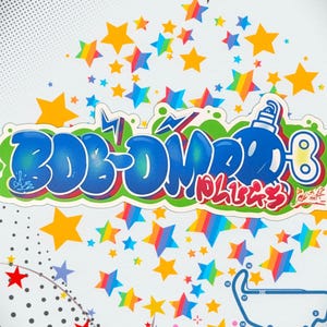 May include: A colorful graphic design featuring the text "BOB-OMBD" in blue bubble letters, with a bomb illustration. The design is surrounded by green and white outlines, with scattered yellow, rainbow, and red stars on a white background.