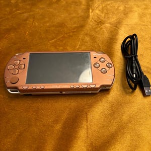 Sony PSP Slim 2000/3000 Modded with Games Comes with New Battery New Charger