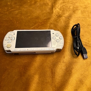 Sony PSP Slim 2000/3000 Modded with Games Comes with New Battery New Charger