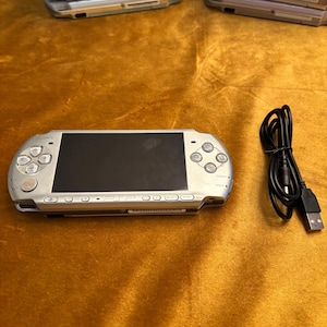 Sony PSP Slim 2000/3000 Modded with Games Comes with New Battery New Charger