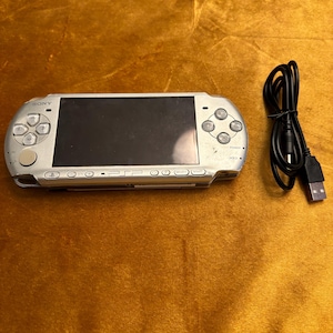 Sony PSP Slim 2000/3000 Modded with Games Comes with New Battery New Charger