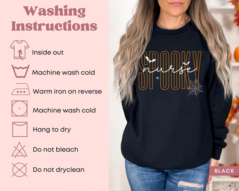 Puede incluir: Sudadera negra de manga larga con las palabras "Spooky Nurse" en naranja y blanco, con murci&eacute;lagos y un dise&ntilde;o de telara&ntilde;a. Tambi&eacute;n se muestran las instrucciones de lavado.