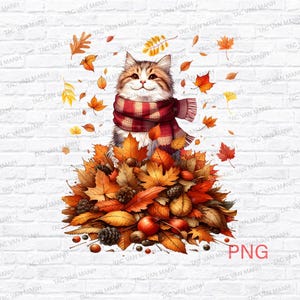 K&ouml;nnte beinhalten: Digitale Illustration einer getigerten Katze mit einem rot-wei&szlig; karierten Schal, die auf einem Haufen Herbstbl&auml;tter sitzt. Die Bl&auml;tter sind in verschiedenen Orange-, Braun- und Gelbt&ouml;nen gehalten, mit fallenden Bl&auml;ttern um die Katze herum. Der Hintergrund ist eine wei&szlig;e Backsteinmauer.