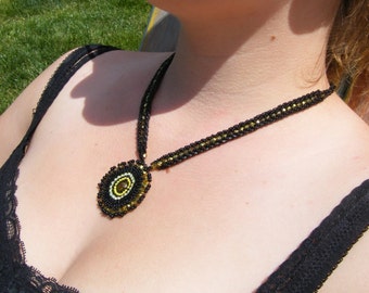 Black and Yellow necklace, simple but elegant. Made with seed beads, fire polished beads, and some cube beads