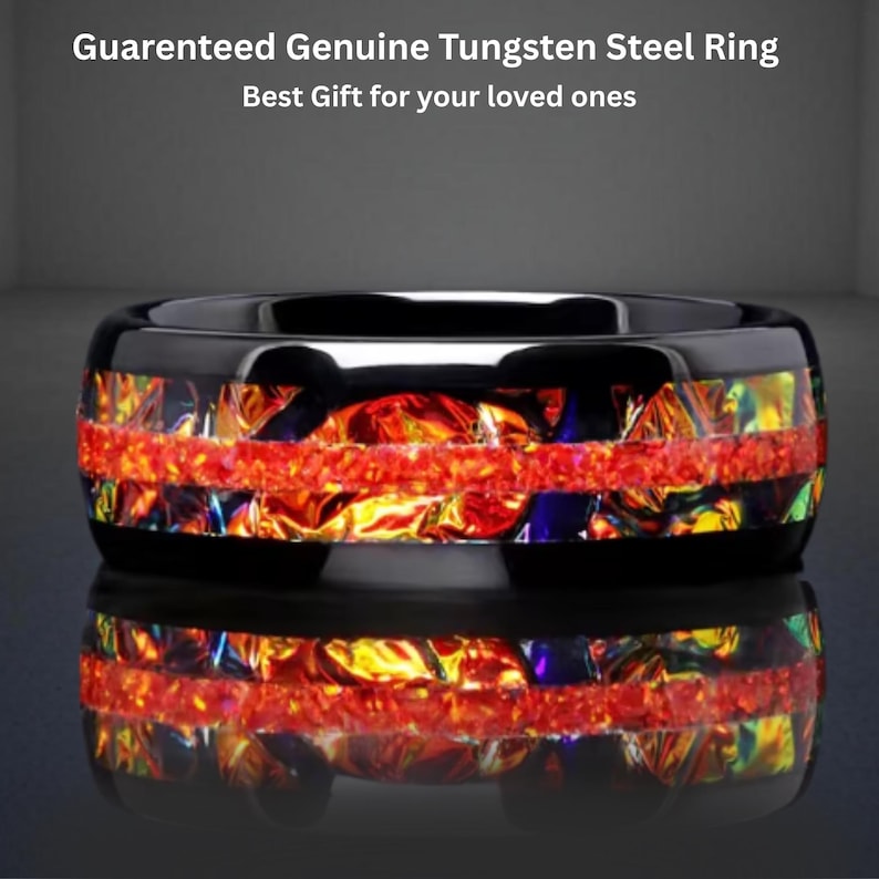 May include: A black tungsten steel ring with a vibrant, multi-colored inlay of red, orange, yellow, and blue. The ring has a glossy finish and the text "Guaranteed Genuine Tungsten Steel Ring Best Gift for your loved ones".