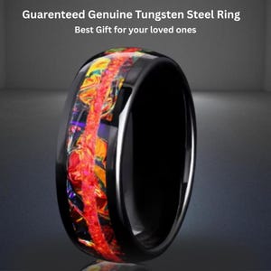 May include: A black tungsten steel ring with a vibrant, colorful inlay of red, orange, and yellow. The ring has a glossy finish and the text "Guaranteed Genuine Tungsten Steel Ring" and "Best Gift for your loved ones".