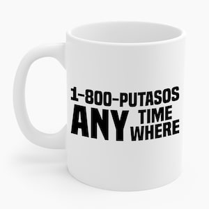 May include: White ceramic mug with a black text design. The text reads "1-800-PUTASOS ANY TIME WHERE". The mug has a curved handle and a glossy finish. The design is centered on the mug.