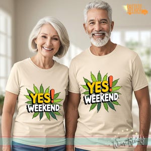 May include: Two people wearing beige t-shirts with a green marijuana leaf design and the text "Yes! Weekend".