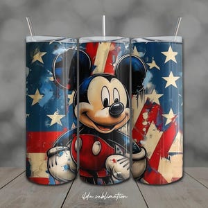 May include: Three stainless steel tumblers with lids and straws. Each tumbler features a patriotic design with the American flag and a smiling Mickey Mouse. The tumblers have a distressed, vintage look. The text "ilda sublimation" is at the bottom.