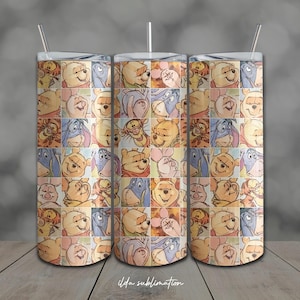 Puede incluir: Tres vasos de acero inoxidable con pajitas, cada uno con un diseño de patchwork colorido de Winnie the Pooh y sus amigos. El diseño incluye personajes como Pooh, Piglet, Eeyore y Tigger. El texto "ilda sublimation" está en la parte inferior.