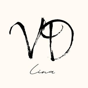 May include: Black brushstroke design of the letters "VD" with the word "Cina" in a cursive font below. The design is on a cream-colored background. The letters are thick and bold.