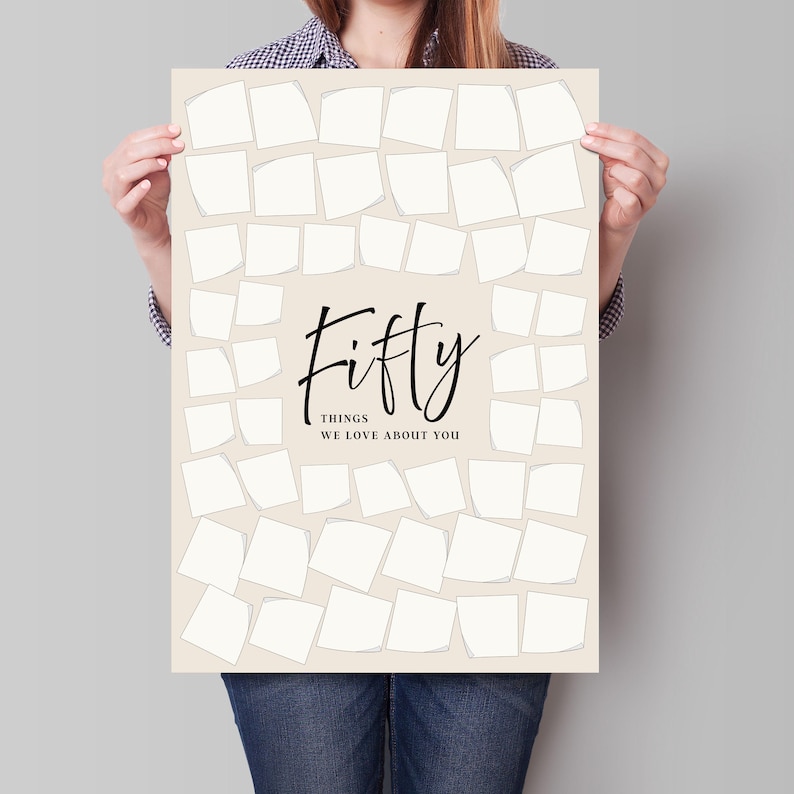 May include: A beige poster with the word "Fifty" in elegant black script, with "THINGS WE LOVE ABOUT YOU" below. The poster has numerous blank, square spaces for notes, perfect for a personalized gift.