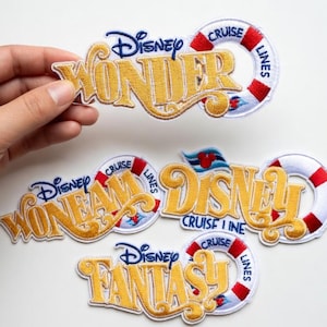 May include: Embroidered patches featuring the Disney Cruise Line logo and ship names: Wonder, Dream, Fantasy, and Disney. Each patch has a gold-colored font, a red and white life preserver, and the Disney logo in blue.