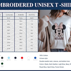 May include: White unisex t-shirt with an embroidered Minnie Mouse design. The shirt features a double-needle neck, sleeves, and bottom hem. Available in various colors, including black, dark heather, light blue, navy, red, white, royal blue, sport grey, and forest green. Made of 100% cotton.