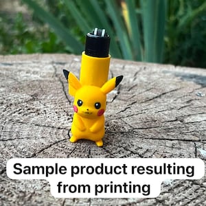 May include: A yellow Pikachu-shaped lighter cover featuring black-tipped ears, red cheeks, and a black ignition mechanism at the top. The text "Sample product resulting from printing" is overlaid on the image in a white rectangular box.