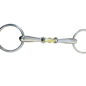 May include: A stainless steel horse bit with a gold-colored center. The bit features two circular rings on either side, connected by a central mouthpiece. The design is simple and functional, typical of equestrian equipment.