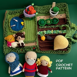 May include: A crochet play mat featuring a garden scene with a blue pond, a wheelbarrow with orange vegetables, and rows of brown soil with green plants. Three small crochet dolls are included: an elderly person, a bearded person, and a child.