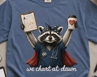 Funny Nurse T-Shirt, We Chart At Dawn Raccoon Graphic Tee