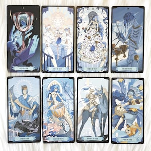 May include: A set of eight tarot cards from the suit of cups, featuring stylized illustrations in shades of blue, white, and gold. The cards are labeled Ace of Cups, Two of Cups, Three of Cups, Four of Cups, King of Cups, Queen of Cups, Knight of Cups, and Page of Cups.
