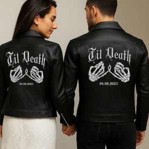 May include: Black leather jackets featuring the text "Til Death" and a skeleton hand design on the back. The date "04.08.2023" is printed below the design. The jackets have a classic biker style with zippers and a tailored fit.