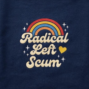 May include: Navy blue sweatshirt with an embroidered design. The design features a rainbow, stars, and the words "Radical Left Scum" in a retro font. A yellow heart is also included in the design.