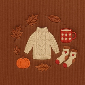 May include: An embroidered design featuring a cream-colored cable-knit sweater, surrounded by autumn leaves, a pumpkin, a red plaid mug, and socks with hearts. The background is a solid brown color, creating a cozy, fall-themed aesthetic.
