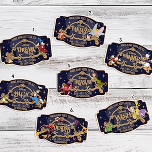 May include: A collection of seven navy blue Disney-themed stickers. Each sticker features a different Disney theme, such as "Dream," "Fantasy," and "Wonder," with corresponding characters and gold accents. The stickers include the text "Where Magic Meets the Sea."