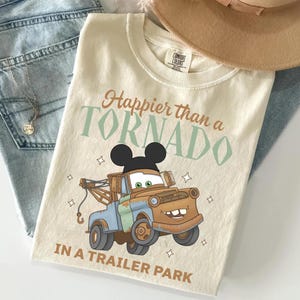 May include: A rustic wooden sign with the text "Welcome to our home" in white lettering. The sign features a distressed finish and a simple, inviting design, perfect for entryway decor.