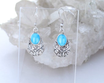 Hermosos pendientes de color turquesa Blue Ridge Orvil Jack grabados en ley