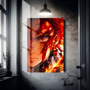 Può includere: Una vivace stampa artistica in stile anime con un personaggio dai capelli rosso fuoco e occhi intensi. L'opera d'arte mostra un primo piano del volto del personaggio, con un uso dinamico di tonalità arancioni e rosse e dettagli intricati.