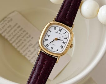 Vintage Seiko Gold Tone Octagon Case Watch With Leather Strap