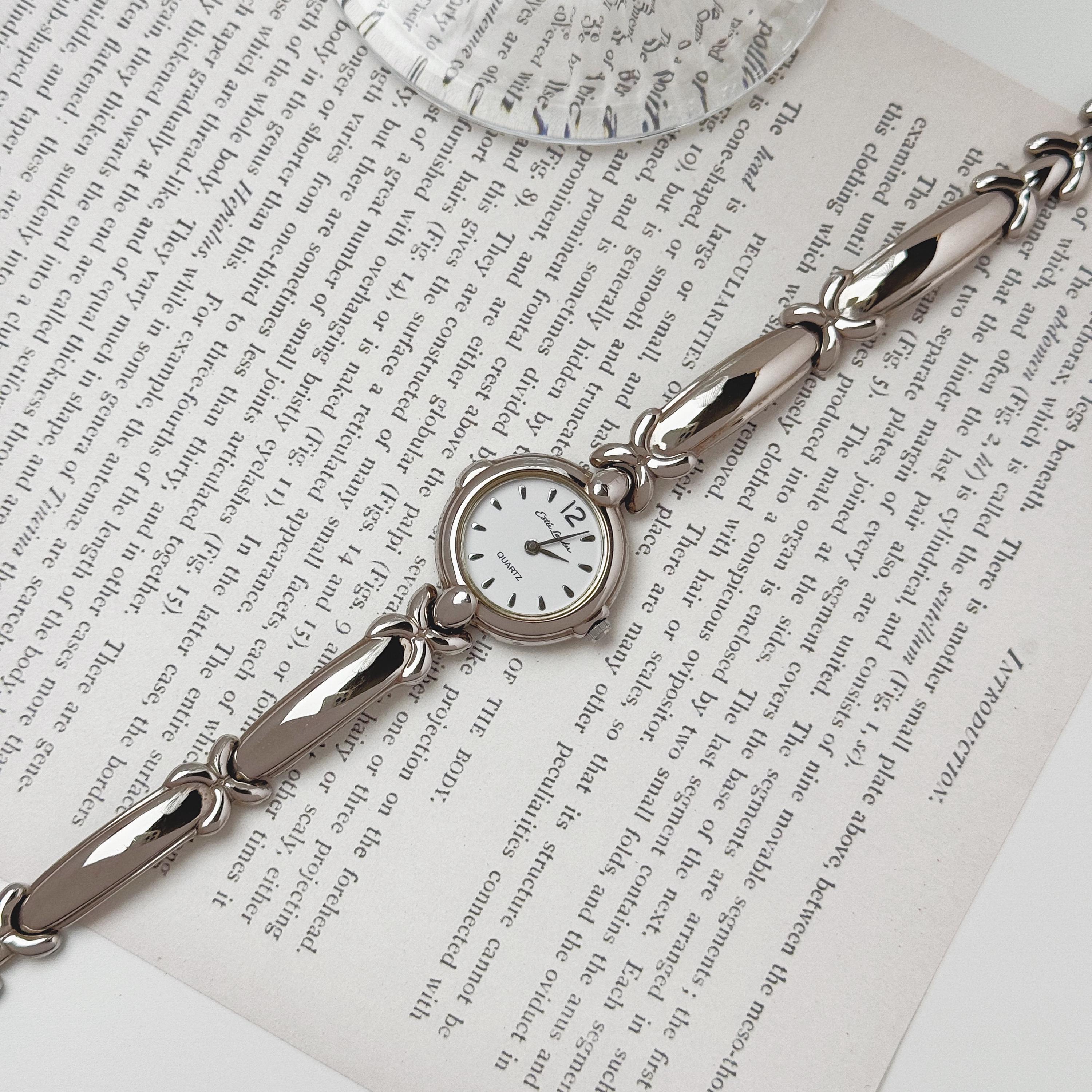 Estée Lauder Montre ton argent, Montre-bracelet de style jonc, Montre-bracelet pour femme