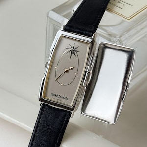 Reloj de pulsera rectangular unisex Seiko Junko Shimada vintage, tono plateado, modelo Peek a Boo, RARO.