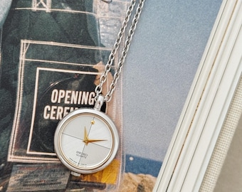Reloj colgante vintage Seiko en tono plateado con cadena