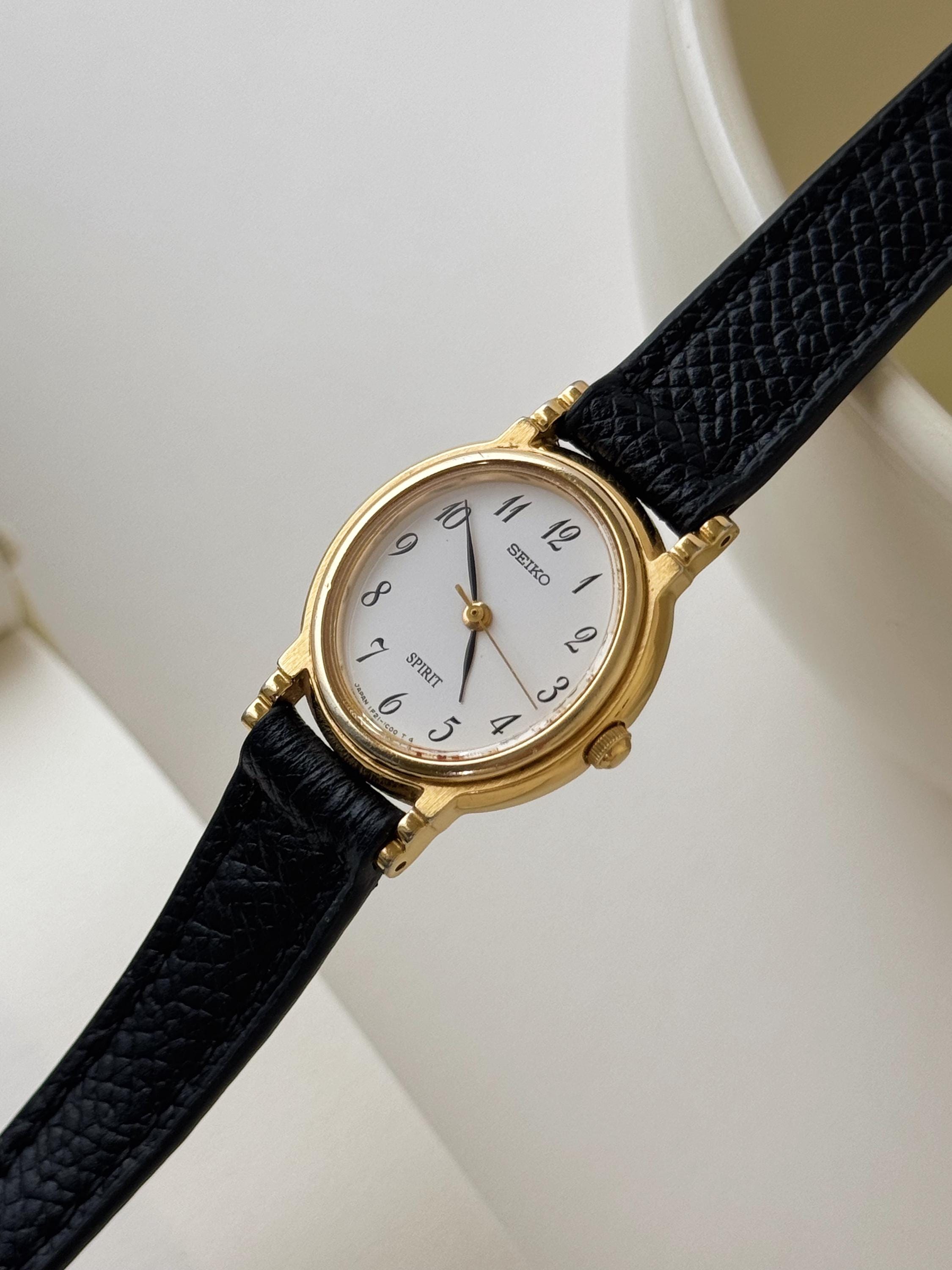Vintage Seiko Spirit Gold Tone Oval Case Watch Leather Strap