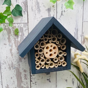 Beautifully handmade wildlife habitat, Bee Hotel, Insect House. Timber and painted in dark grey.
Keyhole hanger provided.
Bamboo and drilled holes provide a perfect home for solitary bees.