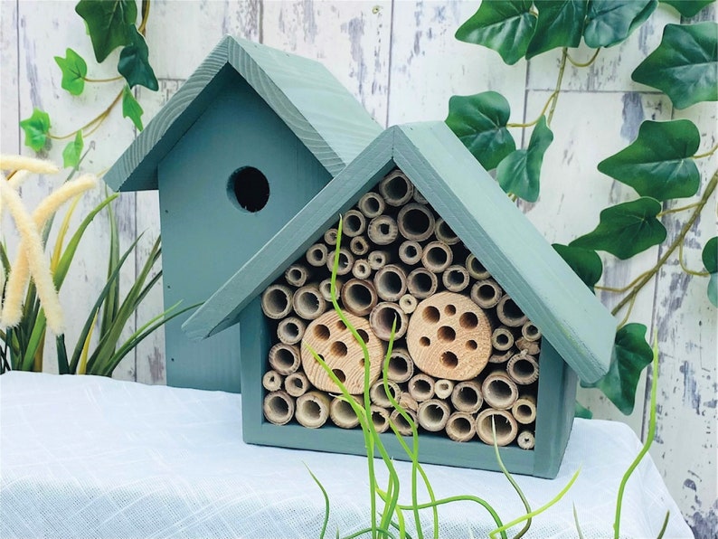 Bird box has a 28mm hole to allow a large range of birds to use.
Bamboo and drilled holes are a perfect home for solitary bees.