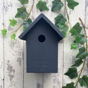 Handmade wooden Bird box in Urban Slate, dark grey. This one is engraved with a birthday message, why not add your own? 
Our bird boxes have a 28mm hole to allow a large range of birds to use.