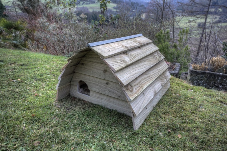 Handmade wooden hedgehog house. Keeps them safe from cats, dogs and foxes.
The hedgehog house is aprox 65cm long, 55cm wide and 50cm high.