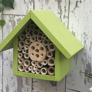 Beautifully handmade single tier wildlife habitat, Bee Hotel, Insect House. Timber and painted in Sunny Lime.
Keyhole hanger provided.
Bamboo and drilled holes provide a perfect home for solitary bees.