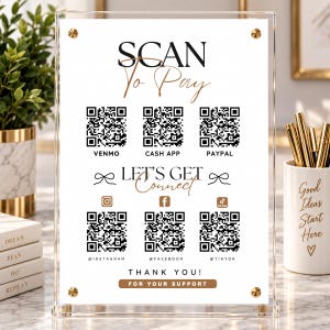 Könnte beinhalten: Ein Schild aus klarem Acryl mit der Aufschrift SCAN To Pay und drei QR-Codes für Venmo, Cash App und PayPal. Darunter befindet sich der Text LET'S GET Connect mit Social-Media-Symbolen und QR-Codes für Instagram, Facebook und TikTok sowie THANK YOU!