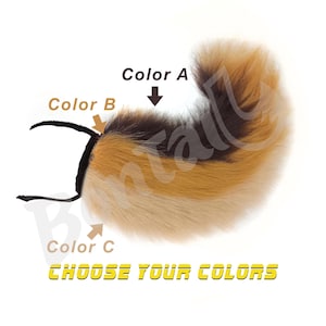 Puede incluir: Una cola de piel sintética con una correa negra. La cola presenta un degradado de colores, incluyendo marrón oscuro, naranja y crema. El texto "CHOOSE YOUR COLORS" se muestra en amarillo.