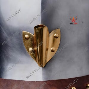 Close-up of Plum Holder Brass