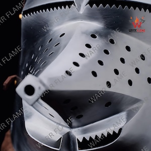 Close-up of visor and rivets – antique finish steel armor helmet