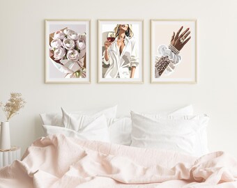 May include: Three framed illustrations: a bouquet of pink flowers, a woman holding a glass of red wine, and a hand wearing a pearl bracelet and a ring.