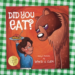 May include: A children's book cover with the title "DID YOU EAT?" in white letters. An illustration shows a person holding a plate of spaghetti and a grumpy-looking bear. The book is signed by the author.