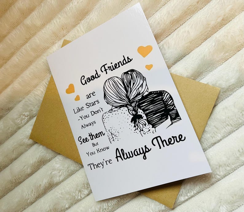 May include: A white card with black text and a black and white illustration of two women with their arms around each other. The text reads "Good Friends are Like Stars - You Don't Always See them But You Know They're Always There".