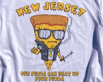 May include: White t-shirt with a cartoon pizza slice wearing sunglasses and a leather jacket. The pizza slice is holding a sword and smoking a cigarette. The text "NEW JERSEY" is above the pizza slice and the text "OUR PIZZA CAN BEAT UP YOUR PIZZA" is below the pizza slice.