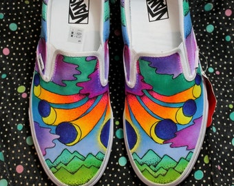 sun and moon slip on vans